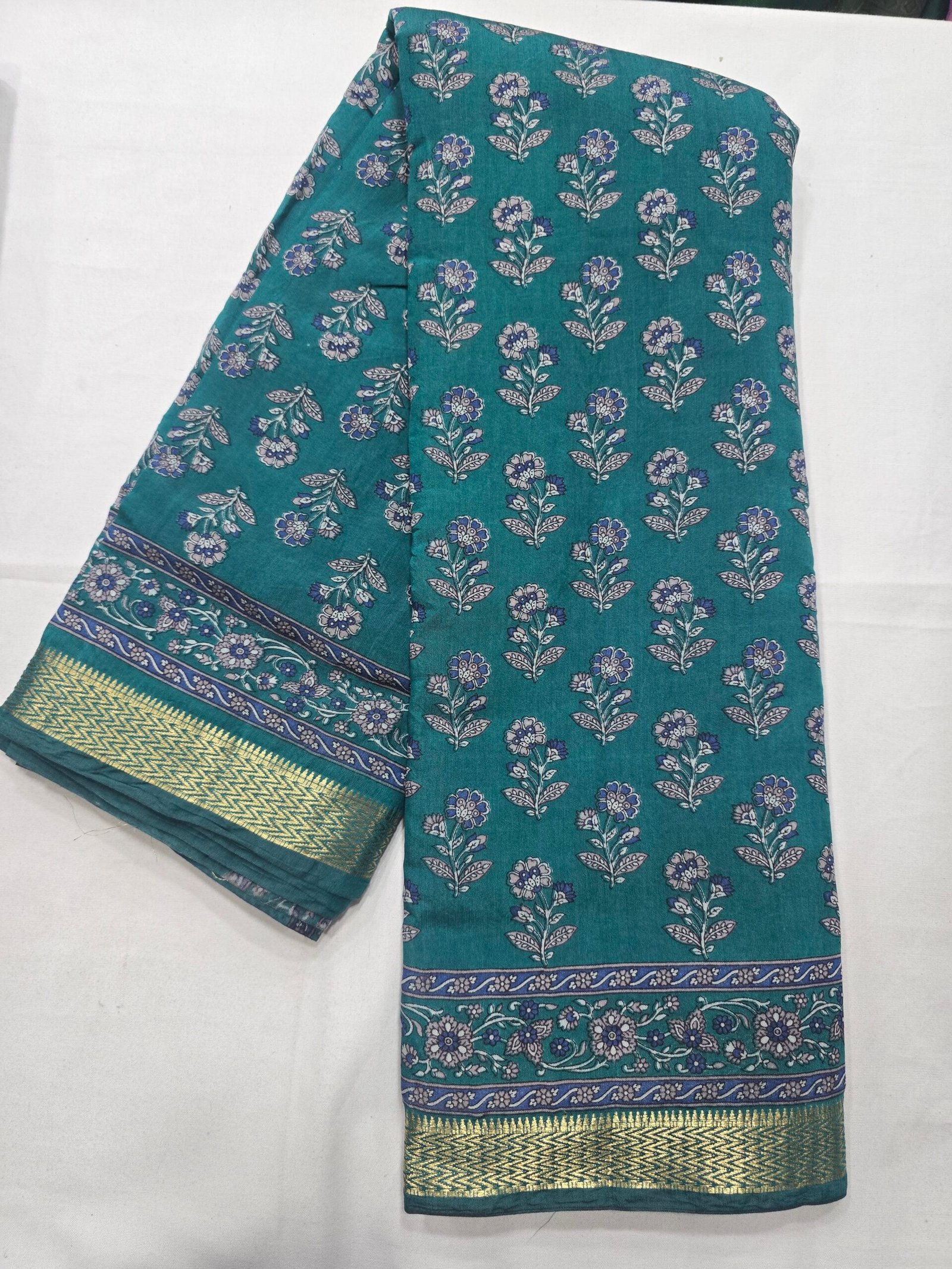 Teal Chanderi printed saree with floral motifs
